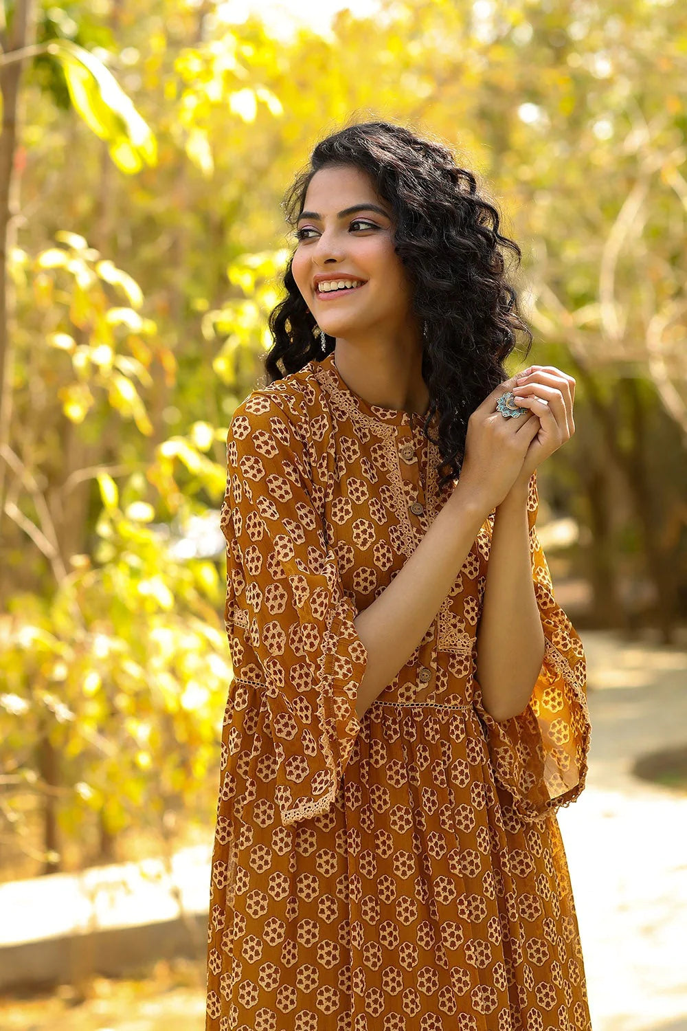 MCJUN-2518 Brown Georgette Printed Flared Dress